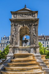 Fototapeta na wymiar Fountain of the Innocents (Fontaine des Innocents, 1547 - 1550) at place Joachim-du-Bellay. Paris. Fountain of the Innocents is oldest monumental fountain in Paris, France.