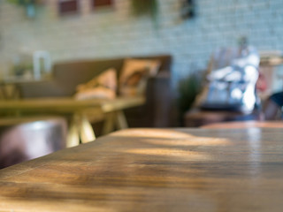 Obraz na płótnie Canvas Empty table with blurry cafe background