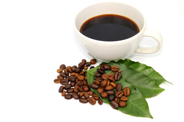 Black coffee cup and coffee seeds
