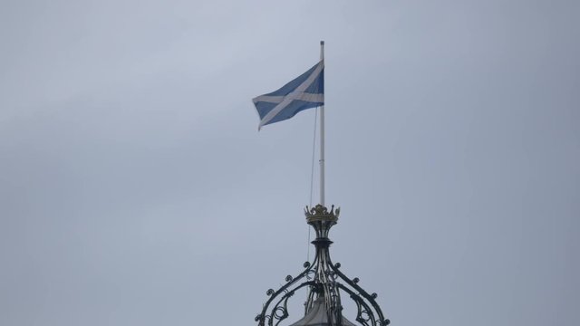 Waving flag on top of a tower