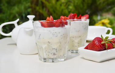 CREAMY COCONUT CHIA SEED GREEK YOGURT PUDDING WITH STRAWBERRY