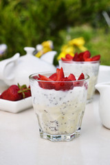 CREAMY COCONUT CHIA SEED GREEK YOGURT PUDDING WITH STRAWBERRY