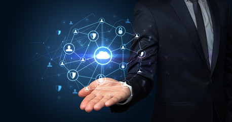 Businessman holding networking connection concept with dark wallpaper