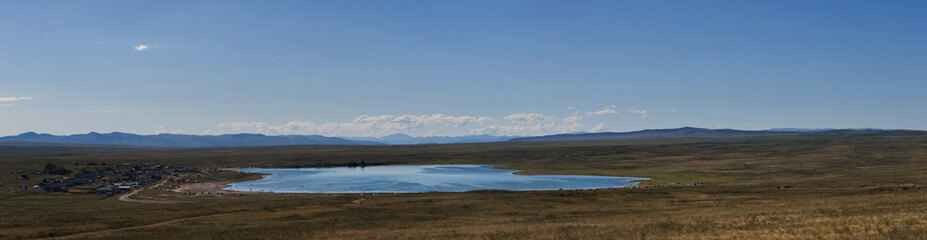 Panorama of Tyva lake Dus-Khol. A wide view of the sky. Summer. Day