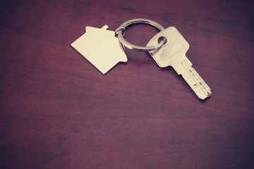 Key on keys chain with house symbol with coptspace