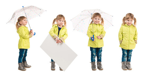funny little girl holding umbrella in hand