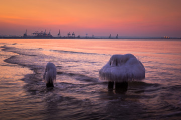 Frozen breakwaters on the Baltic sea near Gdansk, Poland
