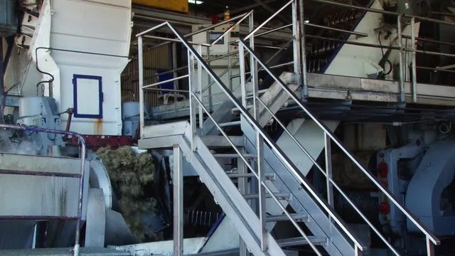 Machine crashing sugar cain pulp at Depaz distillery on Martinique island