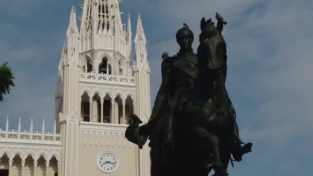 Pigeons on the top of Bolivar statue in Guayaquil, Ecuador 