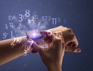 Close up female naked hand wearing smartwatch and numbers around