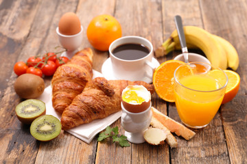 full breakfast on wood background