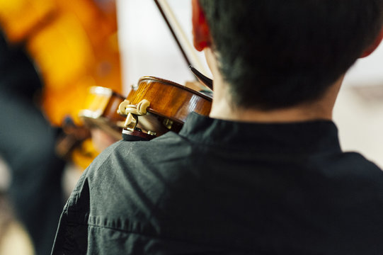 Unrecognizable musician playing violin