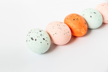 Painted marbled eggs.Happy Easter greeting card.Copy space.White background.