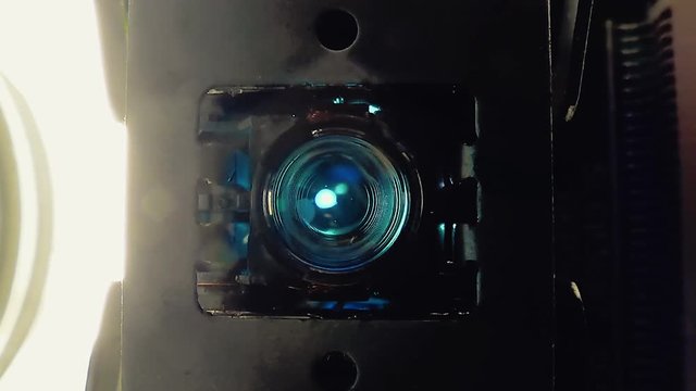 Operation of the laser head when trying to read information from the disk. Close-up. Macro 