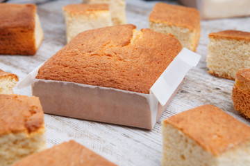 Sobaos pasiegos on an old wooden table