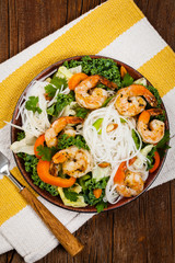 Rice Noodle Kale Salad with Shrimp. Selective focus.