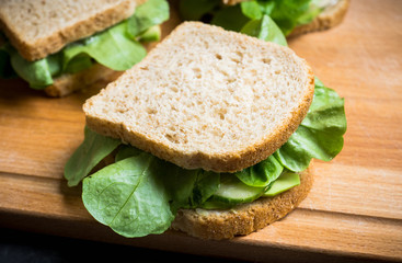 Sandwich avocado, salad and mozzarella. Selective focus.
