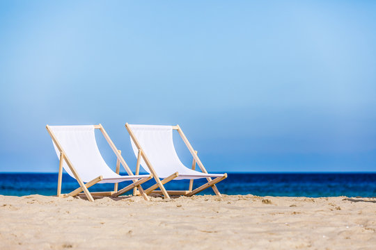 Deck chairs on beach