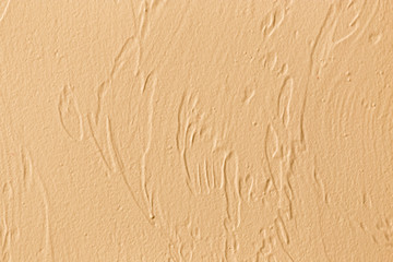 Fototapeta na wymiar Decorative plaster on the wall as a background