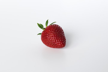 The strawberry isolated over white