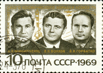 Ukraine - circa 2018: A postage stamp printed in Soviet Union show Soviet cosmonauts A. V. Philipchenko, V. N. Volkov, V. V. Gorbatko. Series: Group Space Flight. Circa 1969.