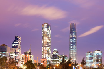 Naklejka premium Skyline of Financial District in Las Condes from Bicentennial park in Vitacura, Santiago de Chile, South America