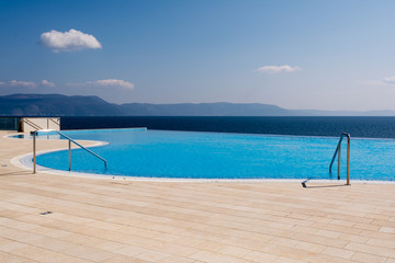 Plakat swimming pool overlooking the sea in Rabac, Istria region , Croatia 