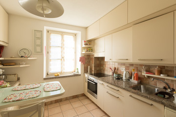 Interiors of modern apartment, kitchen