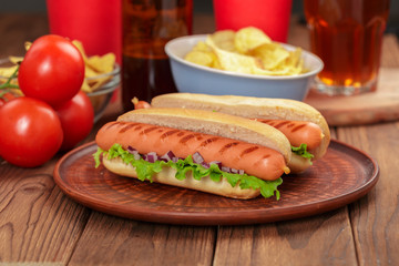 Hot dogs on wooden background