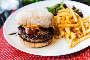 Cheese burger - American cheese burger with Golden French fries