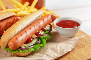 Hot dogs on wooden background