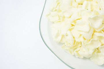 golden potato chips on a white background