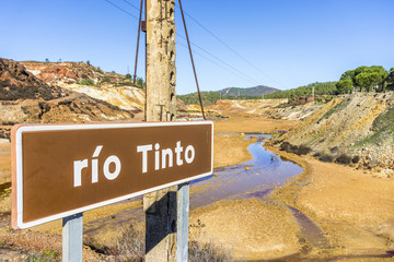 Rio Tinto information sign with the river itself, Andalusia, Spain