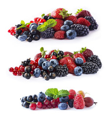 Set of fresh fruits and berries isolated a white background. Ripe blueberries, blackberries, currants, raspberries and strawberries. Berries and fruits with copy space for text. 