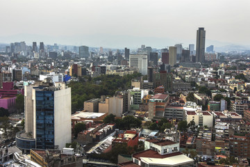 Fototapeta na wymiar Skyline in Mexico City, Reforma aerial view at sunset time