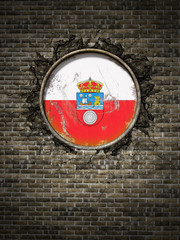 Old Cantabria flag in brick wall