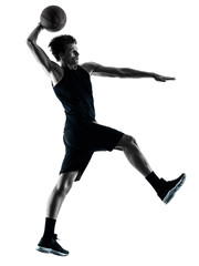 one caucasian basketball player man isolated in silhouette shadow on white background