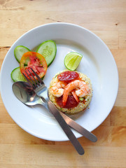 Fried rice with shrimp in a white dish