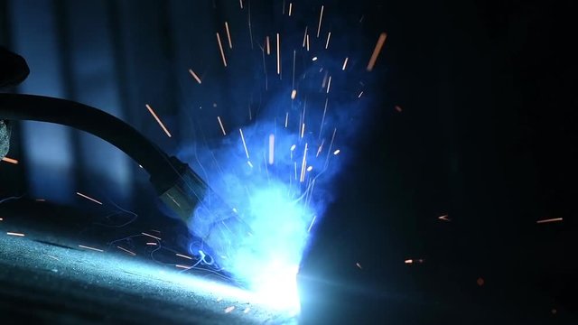 Welding. industrial arc welding work. slow motion