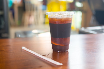 A glass of orange tonic cold brews coffee