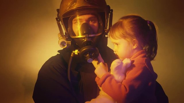Firefighters with rescued child