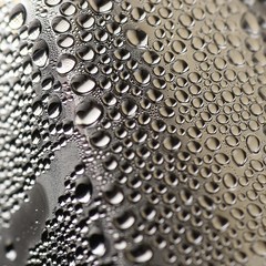 Drops on chrome surface macro