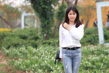 Fototapeta premium woman at the flower garden in Hanoi, Vietnam