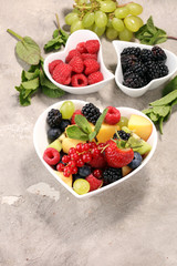 salad with fresh fruits and berries. healthy spring fruit salad