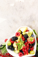 salad with fresh fruits and berries. healthy spring fruit salad