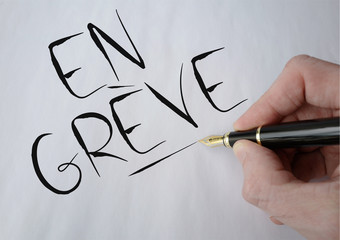 en grève majuscules noir