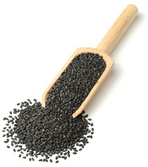 black sesame seeds in the wooden scoop, isolated on white