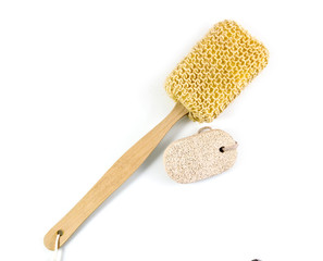 Loofah scrub brush body with long handles on white background.