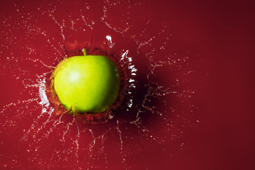 splashing apple