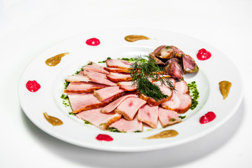 meat plate with sauces and herbs